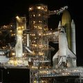 The space shuttle Discovery sits on a launchpad before sunrise Friday at Cape Canaveral, Fla.