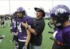 Fayetteville coach Daryl Patton lines up his players while working with the field goal and extra point units during practice Friday at Harmon Field.