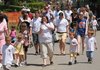 Multipules and their family walk through the Little Rock Zoo during Multipules Zoo Day in April.