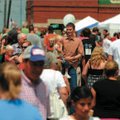 Heavy crowds checked out booths, rides, live music and food at Frisco Festival in downtown Rogers on...