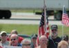 William Terry of Bella Vista joined fellow protesters in a TEA Party to protest federal tax policy outside the Sugar Creek 10 Cinema in Bella Vista on April 15.