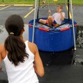 <b>On target</b>
Haley Greathouse, 11, had a good enough pitching arm to dunk Austin Epler three ti...