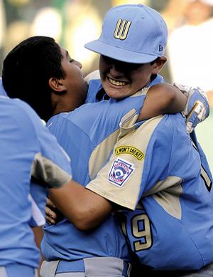 Chula Vista, Calif., players Daniel Porras (left) and Kiko Garcia celebrate their 6-3 victory over Taiwan in the Little League World Series championship game Sunday. 