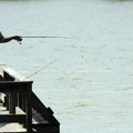 <b>Anglin' for a bite</b>
William Robertson of Fayetteville fishes from a pier at Lake Fayetteville...
