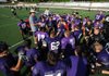 Fayetteville coach Daryl Patton speaks to his players during practice Aug. 14 at Harmon Field. The Dogs open the 2009 season at 5 p.m. today when they travel to War Memorial Stadium in Little Rock to take on Little Rock Central.

