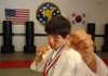 Knight Stagg black belt in Tae Kwon Do recently won gold at the AAU Junior Olympics Aug. 2 in Des Moines, Iowa. Stagg trains at Impact Martial Arts in Fayetteville. 
 