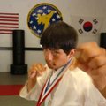 Knight Stagg black belt in Tae Kwon Do recently won gold at the AAU Junior Olympics Aug. 2 in Des Mo...