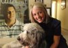 Sarah Eldridge, executive director of Pagnozzi Charities, sits with her Goldendoodle dog, Charlie, in the Pagnozzi Charities office on the Fayetteville Square. She started the job when she was in her early 20s.