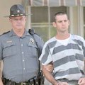 Clifford Dale Casteel of Rogers was led by a Benton County Sheriff's Office deputy to a vehicle for ...
