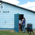 <b>Rounding up the goats</b>
Mayme Mosteller, 12, of Elkins, helps Ginger Mattox, of West Fork, bri...