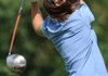 Fayetteville's Olivia Lavy watches her tee shot on the first hole during play Monday at Fayetteville Country Club. 