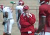 Head Coach Bobby Petrino watches his team practice Tuesday in Fayetteville.