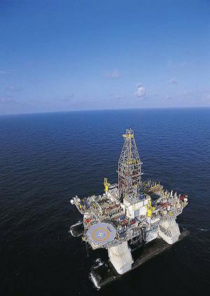 Deepwater Horizon, the semisubmersible oil rig that drilled the 35,055-foot-deep Tiber well, operates in the Gulf of Mexico.