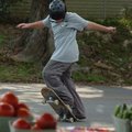 <b>Skating practice</b>
Mitchell Redmond, 13, practices a few moves in front of the stand manned by...