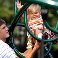 <b>Climbing around</b>
Grace Dunn, 3, of Centerton received help from her dad, Nathan, while she cl...