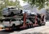 A truckload of Opel automobiles awaits shipping from the company's factory in Bochum, Germany, on Aug. 28.
