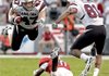 South Carolina's Patrick DiMarco (47) goes airborne after a hit by North Carolina State's C.J. Wilson during the first half Thursday in Raleigh, N.C. The Gamecocks won 7-3.