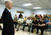 Walter Hussman, chief executive officer of mass media conglomerate WEHCO Media Inc., talks to employees of the Arkansas Democrat-Gazette northwest edition, Northwest Arkansas Times and The Benton County Daily Record on Thursday morning to inform them of the pending merger with The Morning News in the Times' office in Fayetteville. 