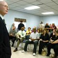 Walter Hussman, chief executive officer of mass media conglomerate WEHCO Media Inc., talks to employ...