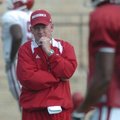 Arkansas coach Bobby Petrino watches his players practice on the UA campus on Sept. 1.