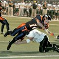 Heritage running back Zac Stewart dove into the end zone for a touchdown during the third quarter of...