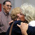 <b>Celebrating 30 years</b>
Jim Chasteen, left, of Garfield watched as his wife, Faye, greeted Sand...