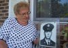 Randi Knebel with a photo of her son, Thomas K. Knebel, taken shortly before this plane crashed.