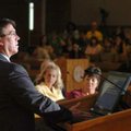 FBI agent Dixon Land talks to local residents about human trafficking in Arkansas Friday during a mo...