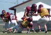 Lincoln's Ezquiel Hernandez (23) is tackles during a scrimmage May 20 in Lincoln.

