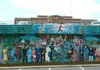 The "lovely mural" will likely be torn down with the rest of the Washington County Courthouse parking garage in Fayetteville due to the high cost associated with preserving it. Demolition is slated to begin at the end of the month. 