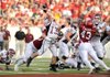 Missouri State junior quarterback Cody Kirby (13) is hit by Arkansas sophomore defensive end Jake Bequette as freshman defensive end Tenarius Wright (43) reaches to deflect his pass during the first half of the Hogs' 48-10 win Saturday in War Memorial Stadium.

