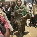 Sudanese journalist and U.N. staffer Lubna Hussein, wearing the same trousers that had sparked her a...