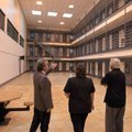 Warden David White (left)) leads a tour for legislators including Sen. Bobby Glover (right), D-Carli...