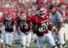 Arkansas' Michael Smith runs for a touchdown during the first quarter of the Hogs' 48-10 win over Missouri State at War Memorial Stadium in Little Rock on Saturday. Smith and the Razorbacks' running backs played a secondary role to the passing game in the season opener.