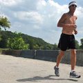 <b>Running man</b>
Jerry Beal of Bentonville ran across the dam while jogging on the Lake Bella Vis...