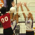  Fayetteville senior Ashleigh Price (19) and senior Sarah Pfitzinger (12) block Northside senior Cha...
