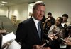 Sen. Max Baucus talks with reporters about his proposed healthcare plan Tuesday in Washington.