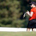 LPGA player Morgan Pressel takes notes while putting on the 18th green Tuesday during a practice rou...