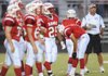 Ramay Junior High coach Craig Foringer works to warm up his team prior to the Indians' game with Woodland Junior High Sept. 3 at Harmon Field.