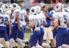 Woodland Junior High coach Bobby Crockett warms up his team prior to the Cowboys' game with Ramay Junior High Sept. 3 at Harmon Field. 

