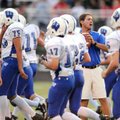 Woodland Junior High coach Bobby Crockett warms up his team prior to the Cowboys' game with Ramay Ju...