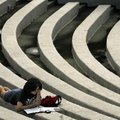 Sophomore Kathleen Hunt of Tulsa studies in the Chi Omega Greek Theatre on the University of Arkansa...