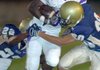 Central Arkansas Christian's Eric Simmons (3) is pulled down by Pulaski Academy's Jarrod Flowers and Dylan Little during Thursday's game. More photos at focus.arkansasonline.com.