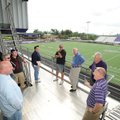Fayetteville High School officials, from right, Wayne Stehlik, Jim Price, Byron Zeagler and coach Da...