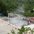 Workers with Vratsinas Construction Co. LLC begin demolition of the Washington County Courthouse par...