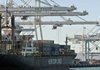 A cargo ship is docked at the Port of Oakland, Calif., on Aug. 12. The Commerce Department said Thursday that U.S. imports rose 4.7 percent in July, the largest percentage monthly advance since 1992.