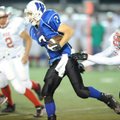 Woodland Junior High defensive back Alex Brignoni (7) returns the ball after making an interception ...