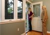 Real estate agent Renee Pierce shows first-time homebuyer Jordan Pierce a house on Cleveland Street in Little Rock on Thursday.