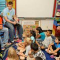 <b>The big guys read</b>
Heritage High School basketball players Evan Giesen, left, and Hayden Love...