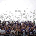 <b>Remembering 9/11</b>
Fans in the Fayetteville High School student section release balloons durin...